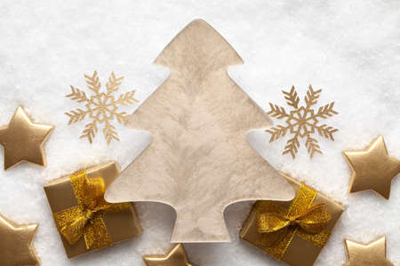 Christmas tree on snow backgroundの写真素材