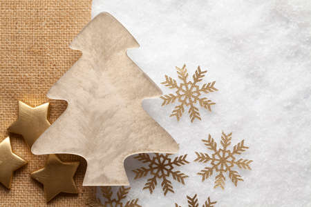 Christmas tree on snow backgroundの写真素材