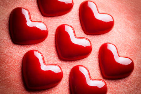 Red hearts on grunge backgroundの写真素材
