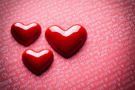 Valentine's Day hearts on paper backgroundの写真素材