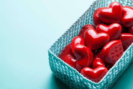Red hearts in blue basketの写真素材