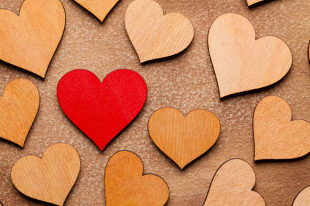 Wooden hearts on paper backgroundの写真素材