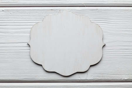 White background or texture - blank wooden plate on planksの写真素材