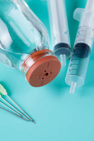 Bottle with medicine and syringeの写真素材