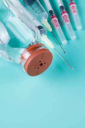 Bottle with medicine and syringeの写真素材
