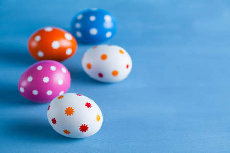Easter eggs on blue backgroundの写真素材