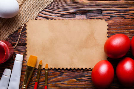 Easter eggs ready to be painted and blank paper cardの写真素材