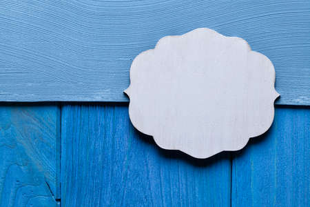 Blank wooden plate on two layer backgroundの写真素材