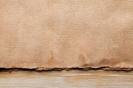 Handmade paper sheet on wooden tableの写真素材