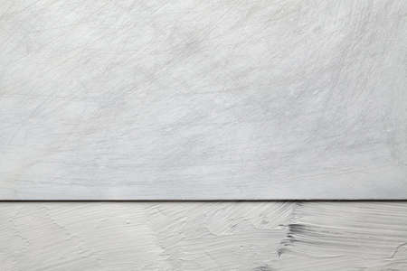 Two layer background - metal surface and plastered wall