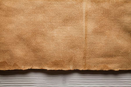 Handmade paper sheet on wooden planksの写真素材