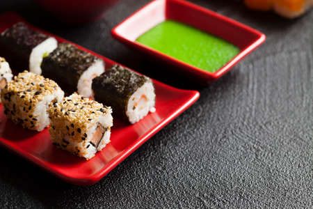 Sushi food on red plate and wasabiの写真素材