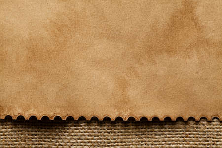 Blank paper sheet on canvas background