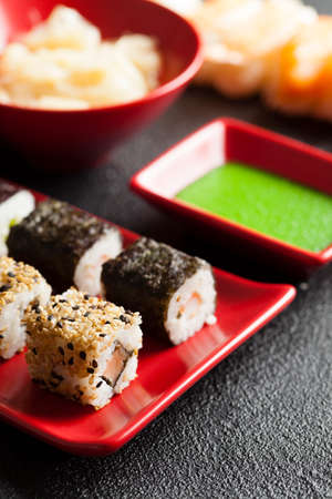 Sushi food on red plate and wasabiの写真素材