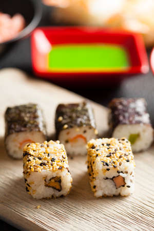 Sushi on wooden plankの写真素材