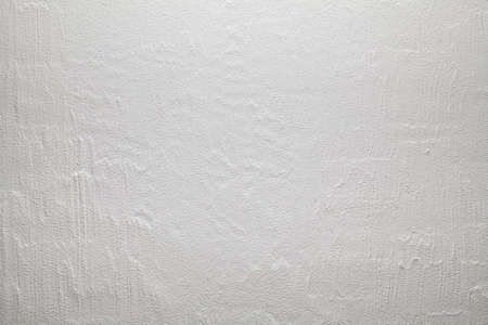 White plaster on the wall background or textureの写真素材