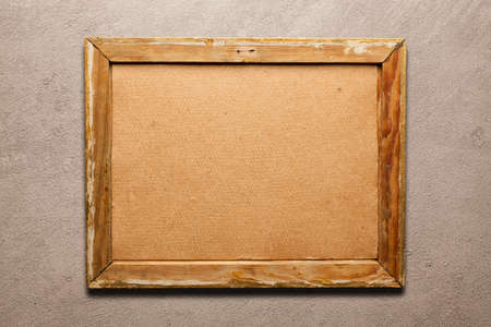 Old damaged wooden picture frame - background or textureの写真素材