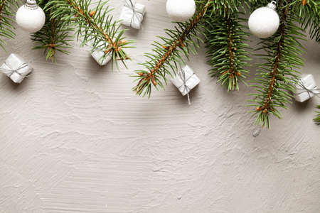 Christmas background - spruce tree and decorations on white backgroundの写真素材