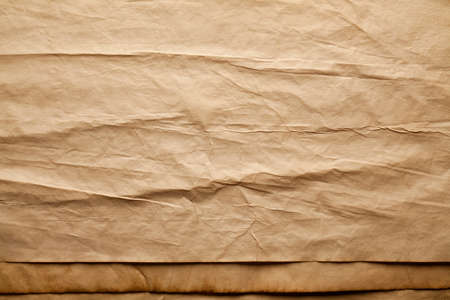Crumpled handmade paper sheet - background or textureの写真素材