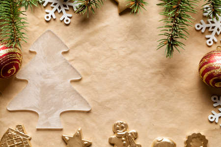 Christmas background - spruce tree and xmas decorations on paper sheetの写真素材