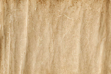 Crumpled handmade paper sheet - background or textureの写真素材
