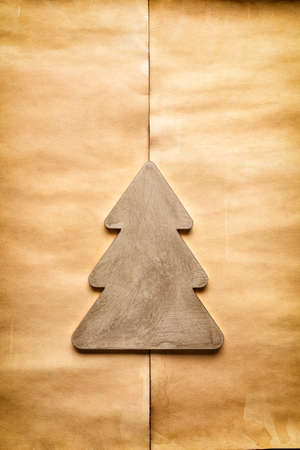 Christmas tree on handmade paper sheet backgroundの写真素材