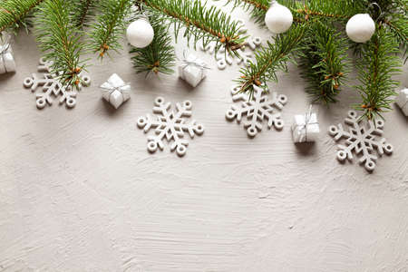 Christmas decorations - gifts, baubles and snowflakes on white backgroundの写真素材