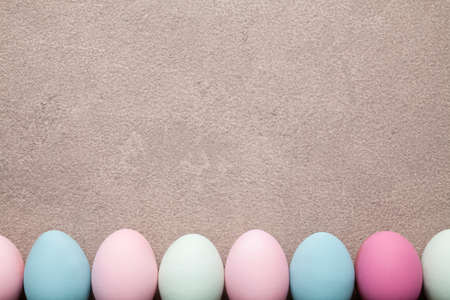 Colored Easter eggs on grunge backgroundの写真素材