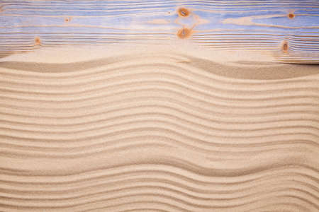 Beach sand and wooden plankの写真素材