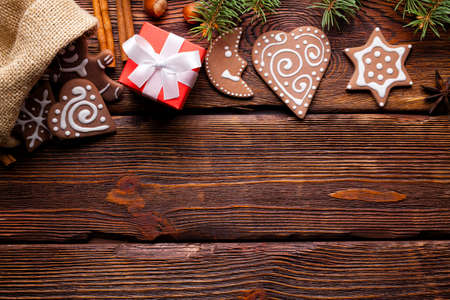 Christmas background - cookies and spices on wooden tableの写真素材
