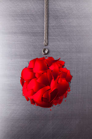 Abstract Christmas bauble and silver metal string on steel backgroundの写真素材