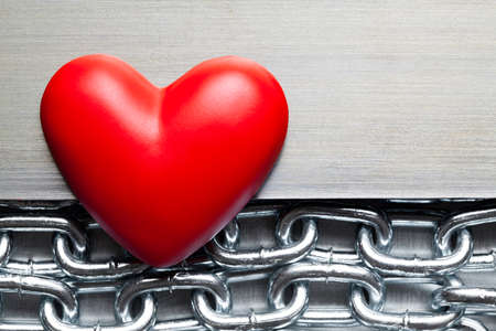 Red heart on metal backgroundの写真素材