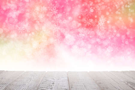 White wooden table with empty space and abstract Christmas backgroundの写真素材