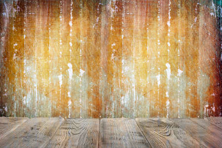 Wooden table with empty space on grunge wall background