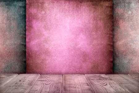 Wooden table with empty space on grunge wall backgroundの写真素材
