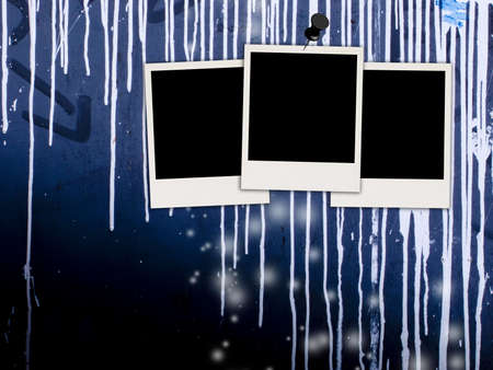Blank Photos on Grungy Wallの写真素材