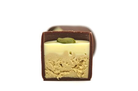 Chocolate Sweets with Pistachio Isolated on White Backgroundの写真素材