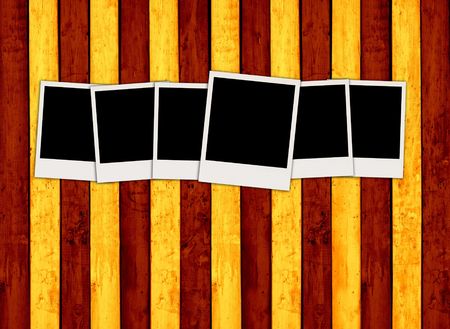 Six Blank Photos on Colorful Wood Backgroundの写真素材