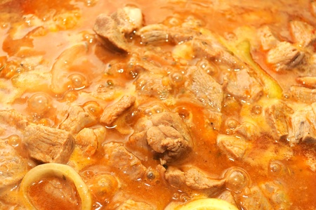 Meat Being Cooked with Onion の写真素材