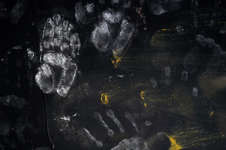 Handprints on Dark Background