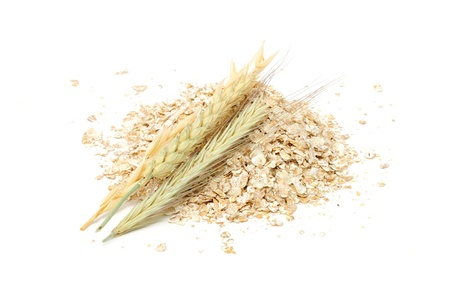 Wheat, Oat, Barley And Rye Flakes with Ears Isolated on White Backgroundの写真素材