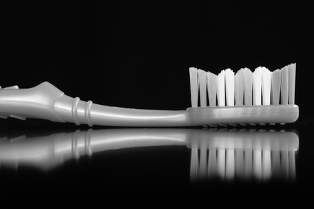 Toothbrush on Black Backgroundの写真素材