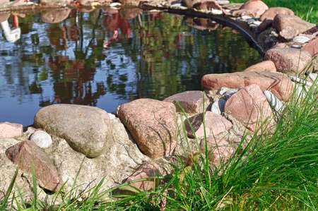 Stone Border Around Garden Pond - HDR Imageの写真素材