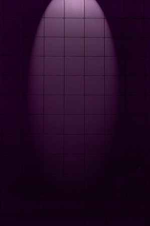 Tiled Purple Background with Spotlightの写真素材