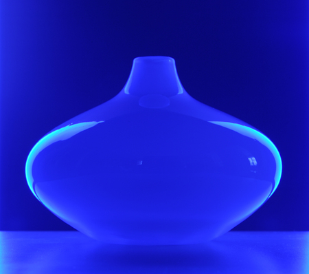 Modern Glass Vase in Blue Lightの写真素材