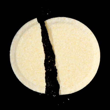 Effervescent Tablet on Black Backgroundの写真素材