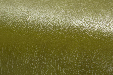 Olive Green Glossy Artificial Leather Background Texture Close-Upの写真素材