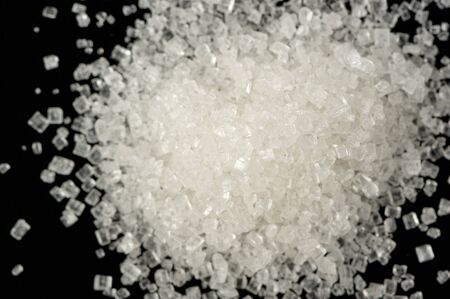 White Sugar on Black Background Macroの写真素材