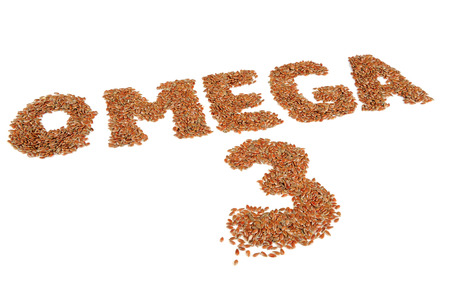 Omega 3 Written in Flax Seeds Isolated on White Backgroundの写真素材
