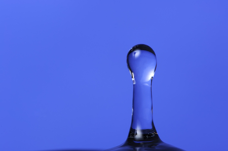 Water Splash on Blue Background with Copy spaceの写真素材